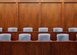 empty seats in a jury box