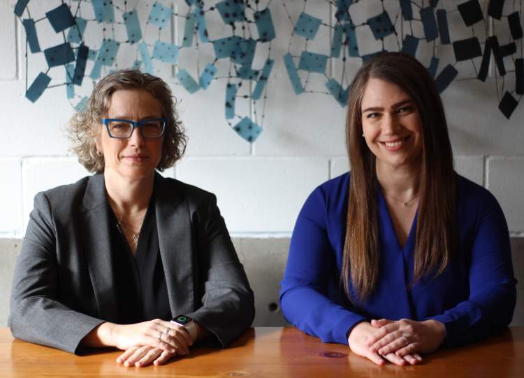 2 Women Smiling