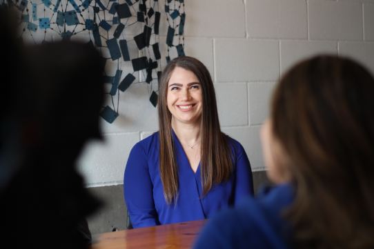 Girl smiling in blue dress